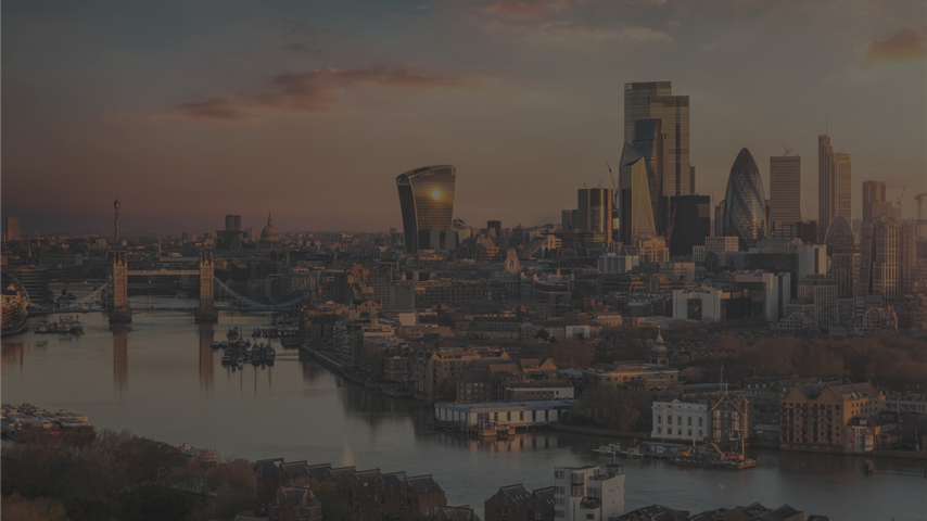 London skyline with finanical district buildings and Tower Bridge over the River Thames